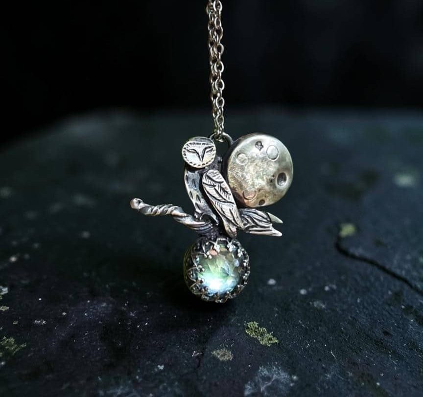 Collier "Noctua" en argent et topaze